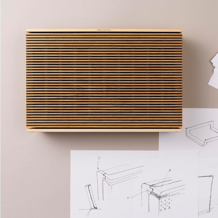 Bang & Olufsen Beosound Level - Difuzor portabil fără fir cu Wifi și Bluetooth (16 ore de funcționare a bateriei), Difuzor durabil certificat Cradle to Cradle - Gold Tone/Wood